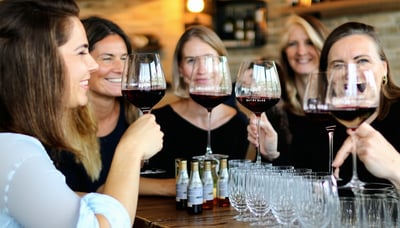 Members of EE Buyers Cooperative enjoying a wine tasting event together